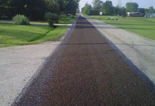 Steel slag aggregate on chip seal rural unpaved road